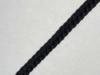 ظفيرة مبرومة بالطراسن